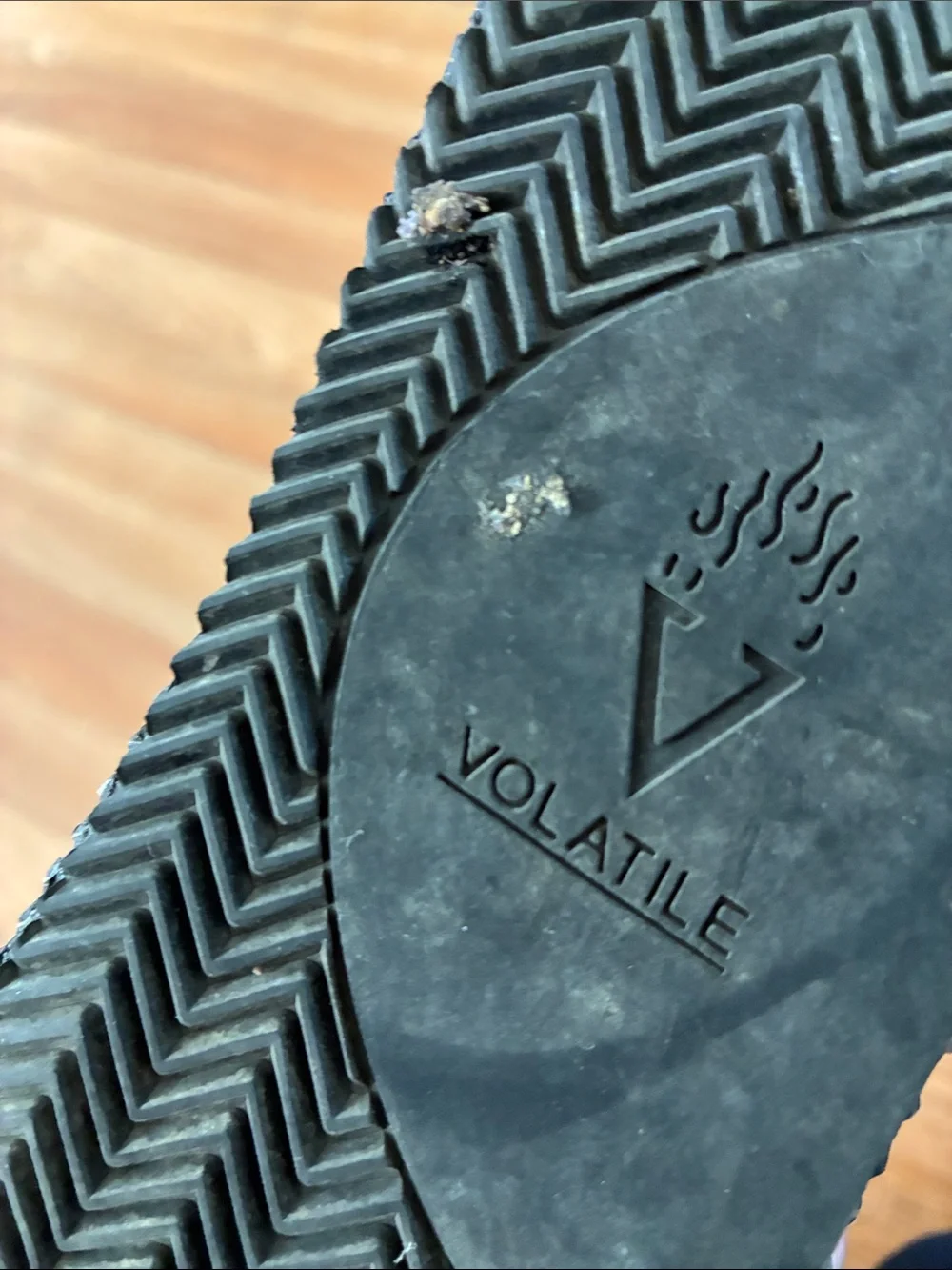Volatile Black Braided Strap Thong Sandals with Yellow Logo